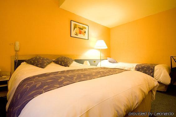 Champerret Heliopolis Hotel Paris Phòng bức ảnh